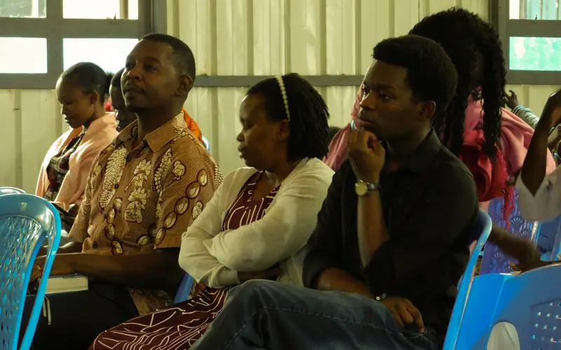 Members sitting together in fellowship