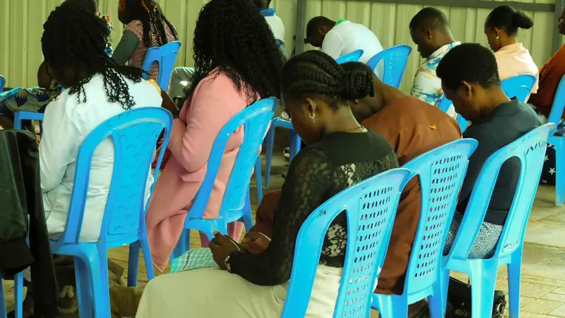Members praying together